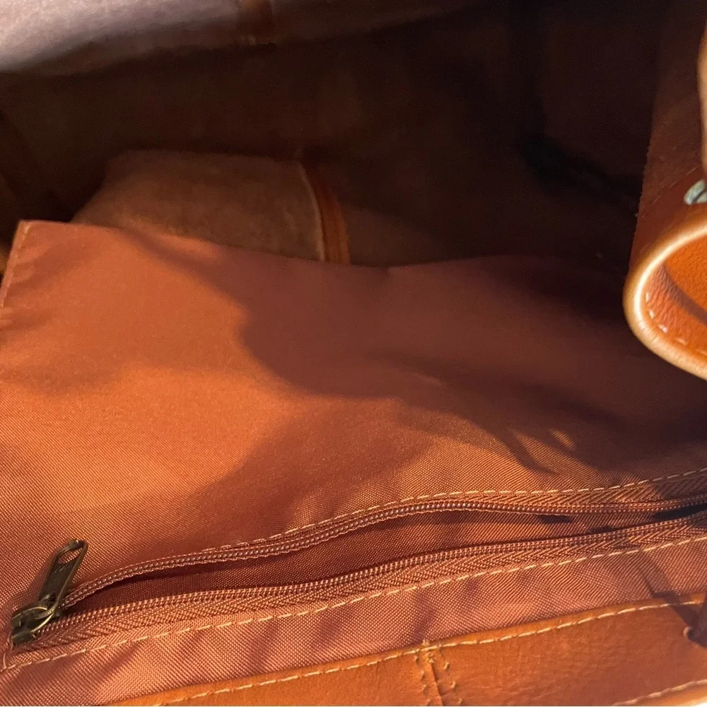 Le Donne Genuine Leather Multi-Pocket Backpack
